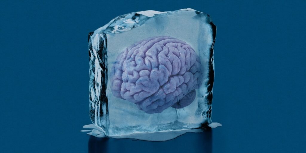 The Download: reawakening frozen brains, and the AI Hype Index returns